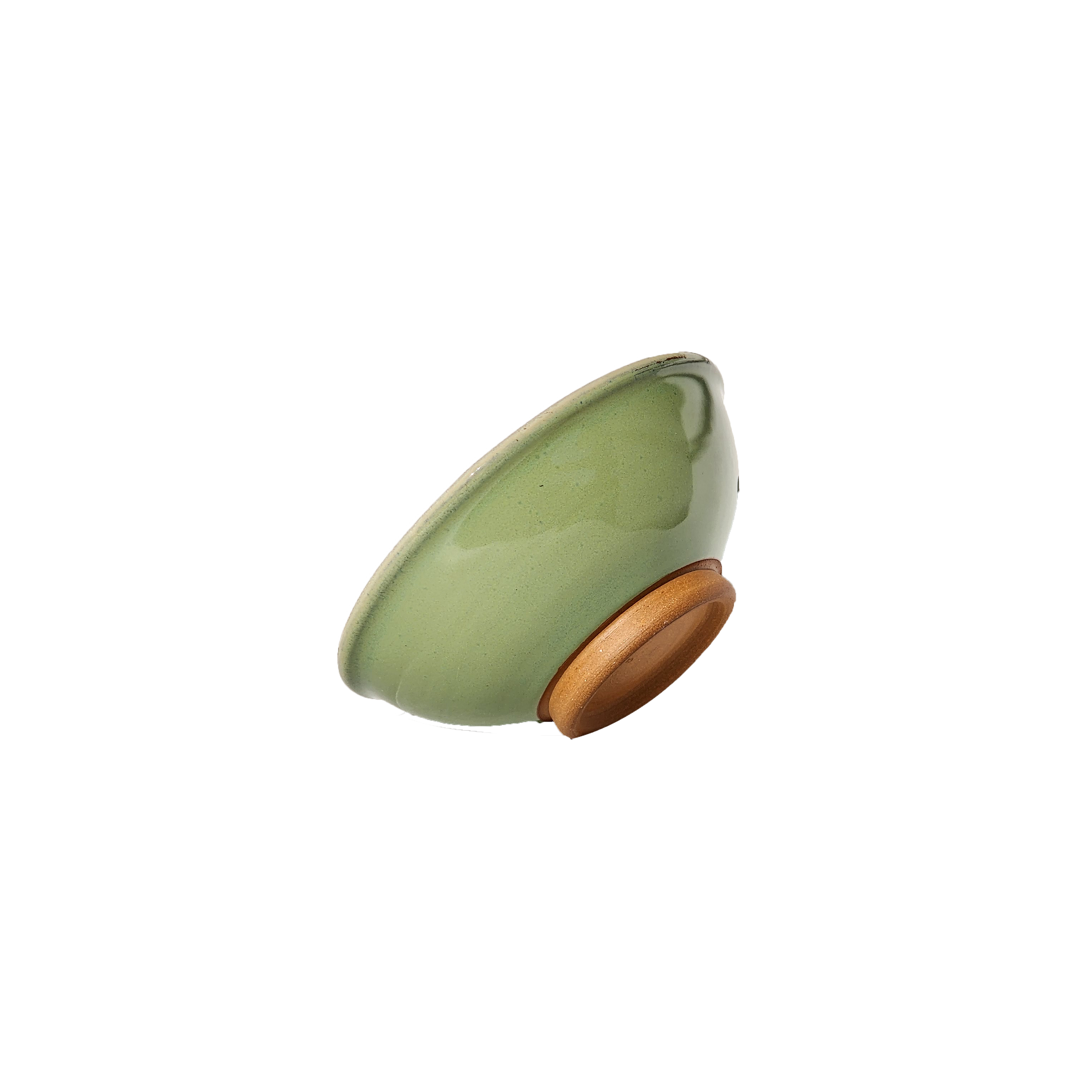 Image: An extra small ceramic bowl in a vibrant bud green color, reminiscent of fresh spring foliage. The bowl features a smooth glaze and rounded edges, offering a pleasing aesthetic and comfortable grip. With a size of 1 cup, it's ideal for holding small servings of food or ingredients