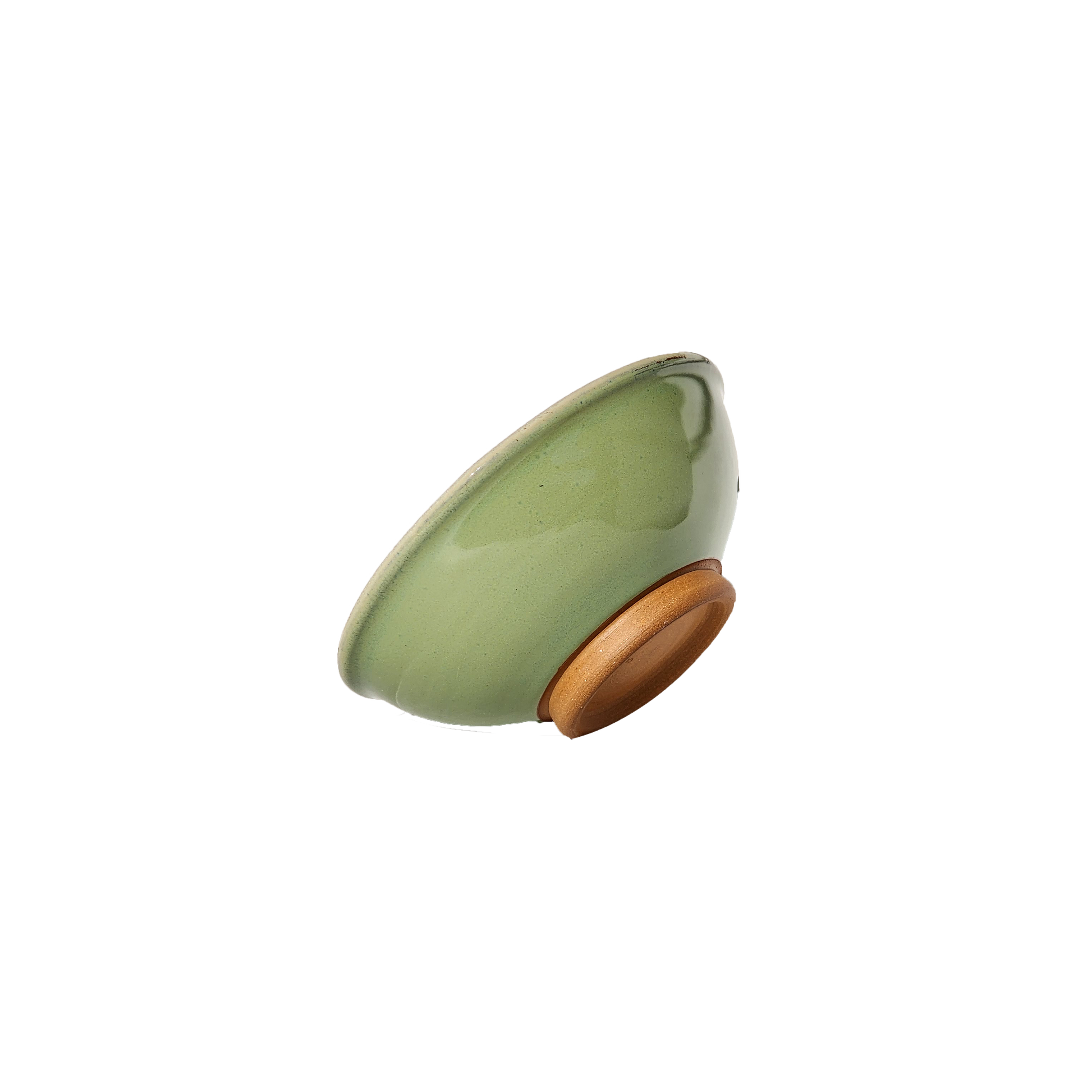 Image: An extra small ceramic bowl in a vibrant bud green color, reminiscent of fresh spring foliage. The bowl features a smooth glaze and rounded edges, offering a pleasing aesthetic and comfortable grip. With a size of 1 cup, it's ideal for holding small servings of food or ingredients