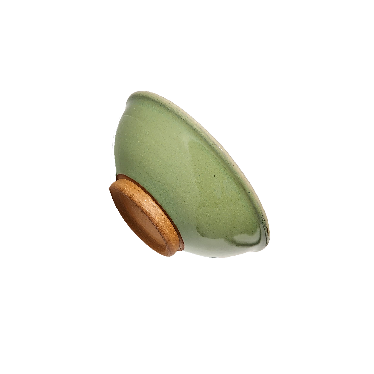 Image: A small mixing bowl in a delightful shade of bud green, offering a convenient capacity of 2.25 cups. Perfect for ingredients, snacks, or condiments, this bowl combines functionality with style for your kitchen needs.