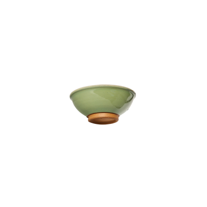 Image: A charming sugar bowl in bud green, offering a delightful pop of color to your tea or coffee station. Holds 4 ounces of sugar, perfect for sweetening your favorite beverages.