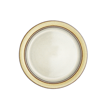 Image Description for Lunch Plate (8.5") in Butter Yellow: A lunch plate from Clinton Pottery's Handmade Dinnerware Collection, featuring a warm "Butter Yellow" glaze. The 8.5-inch plate displays a glossy finish with hues reminiscent of a sun-kissed meadow. Its versatile size is ideal for serving smaller meals or appetizers with a comforting touch of warmth.