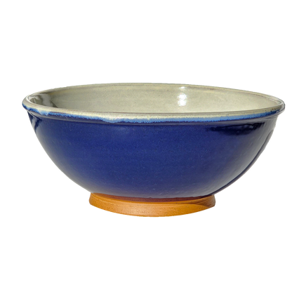A large mixing bowl in deep cobalt blue, featuring a spacious design with a capacity of 12.5 cups. Enhance your kitchen aesthetic with this bold and vibrant addition.