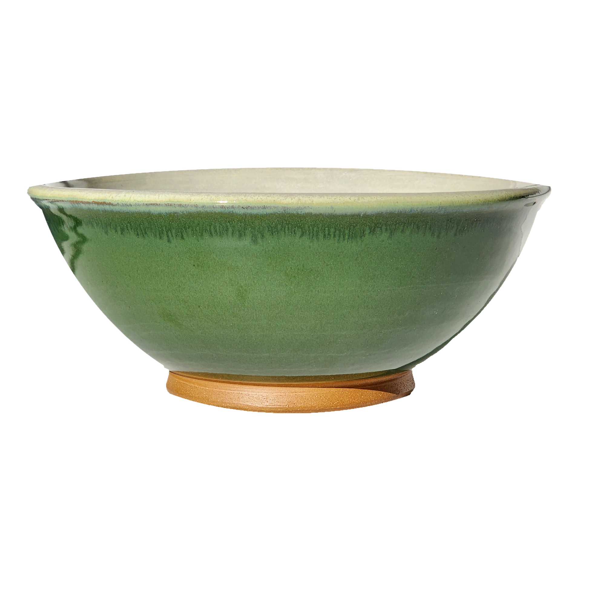 Image: A large mixing bowl in rich dark green, offering plenty of room with a capacity of 12.5 cups. Bring the beauty of nature into your kitchen while preparing delicious meals.