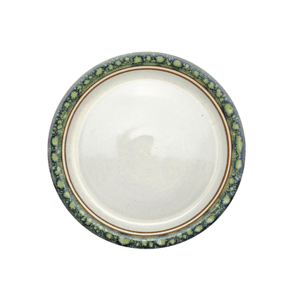 Image Description: A unique froggy bottom dinner plate from Clinton Pottery's Handmade Dinnerware Collection. The 10-inch plate showcases a one-of-a-kind glaze, combining shades of green and blue with golden undertones, reminiscent of a serene pond. Its ample size makes it a charming choice for serving a delightful dinner with a touch of nature-inspired artistry.