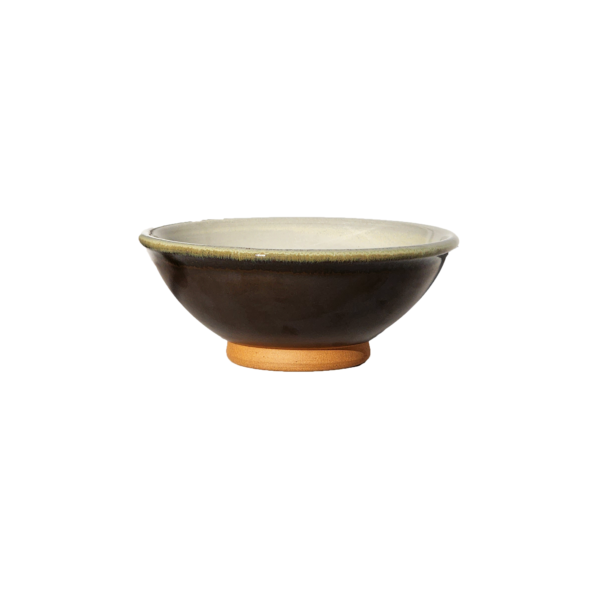 Image: A small mixing bowl in a sophisticated licorice hue, offering a capacity of 2.25 cups. Perfect for ingredients, snacks, or condiments, this bowl adds a sleek and modern touch to your kitchen ensemble.
