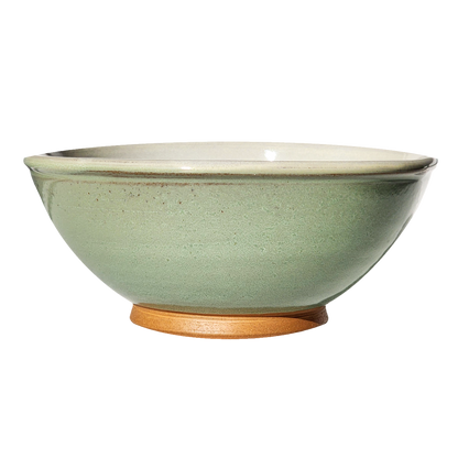 Image: A large mixing bowl in soft light green, providing ample room with a capacity of 12.5 cups. Infuse your kitchen with a sense of tranquility and freshness.
