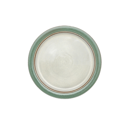 Image Description for Lunch Plate (8.5") in Light Green: A serene light green lunch plate from Clinton Pottery's Handmade Dinnerware Collection. The 8.5-inch plate features a gentle green glaze, evoking the tranquility of a spring meadow. Its versatile size makes it perfect for serving smaller meals or appetizers with a touch of natural charm and freshness.