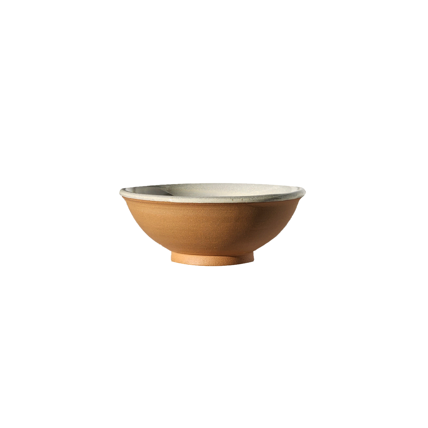 Image: A ceramic bowl in natural, unglazed finish, embodying the raw beauty of handmade pottery. Sized at 1 cup, it adds an organic touch to your table setting.