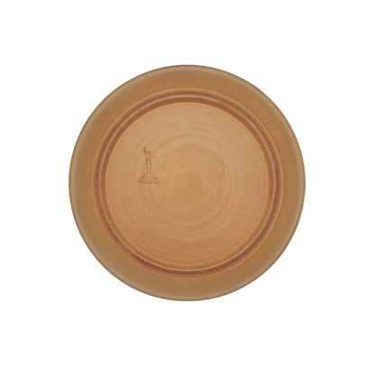 Image: A large pasta dish with a diameter of 10 inches, crafted by Clinton Pottery, featuring a natural glaze. The earthy tones of the natural glaze enhance the dish's rustic charm, making it ideal for serving generous portions of your favorite pasta dishes with a hint of natural beauty.