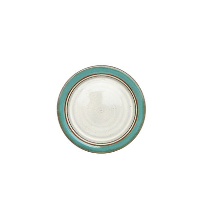 Image Description for Dessert Plate (6.5") in Sky Blue: A dessert plate from Clinton Pottery's Handmade Dinnerware Collection, showcasing a serene and vibrant "Sky Blue" glaze. The 6.5-inch plate exhibits a glossy finish with hues reminiscent of endless blue horizons. Its petite size is perfect for serving delightful desserts or small treats with a touch of tranquil charm.