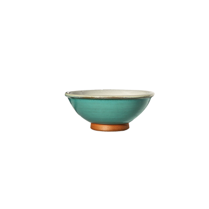 Image: A ceramic bowl in serene sky blue, reminiscent of tranquil summer days. Sized at 1 cup, its calming color enhances any dining experience.