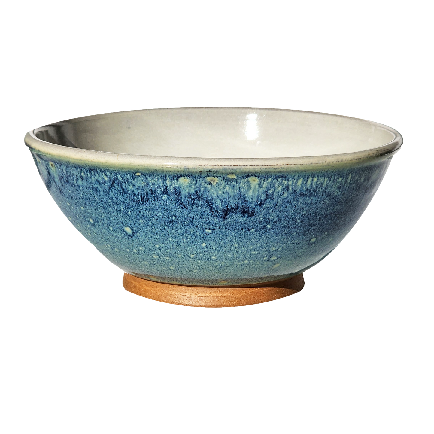 Image: A large mixing bowl in mesmerizing starry night blue, offering plenty of space with a capacity of 12.5 cups. Add a touch of celestial beauty to your kitchen décor.