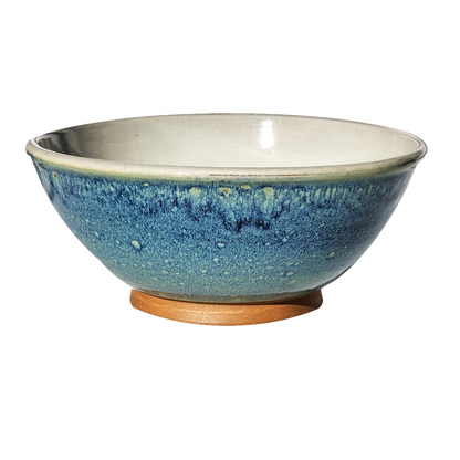 Image: A large mixing bowl in mesmerizing starry night blue, offering plenty of space with a capacity of 12.5 cups. Add a touch of celestial beauty to your kitchen décor.