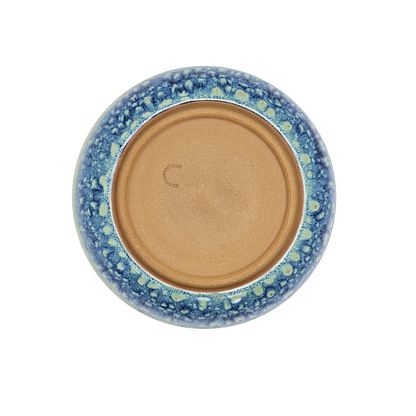  Image Description: A large pasta dish in the "Starry Night" glaze, crafted by Clinton Pottery. With a diameter of 10 inches, this dish features a captivating design reminiscent of a midnight sky filled with twinkling stars. Ideal for serving generous portions of pasta or other delectable meals, adding an elegant touch to any dining experience.